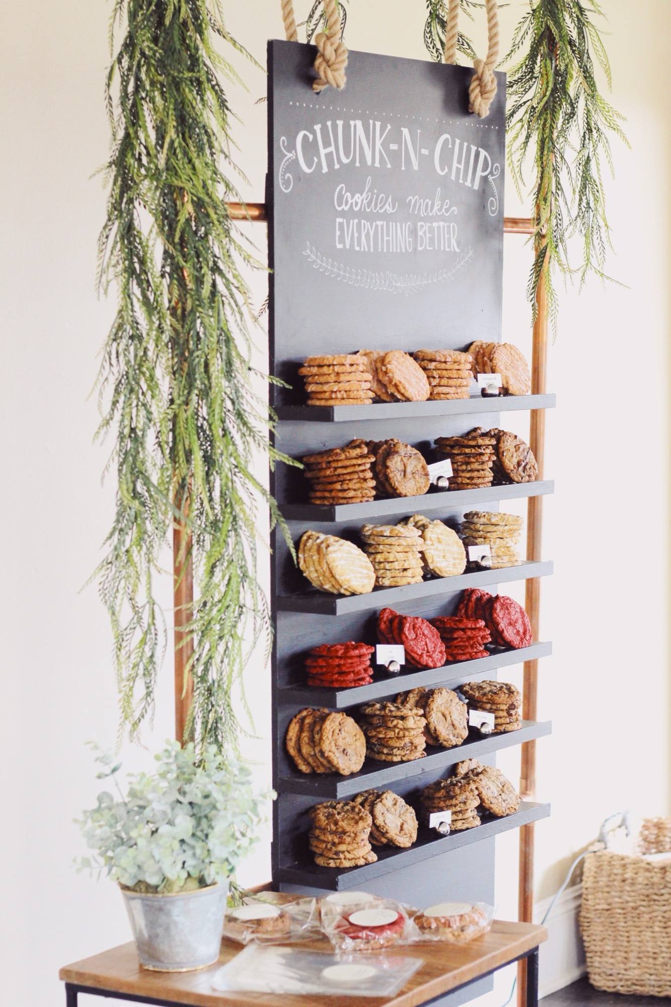 Chunk-N-Chip cookie wall display with shelves of assorted cookies