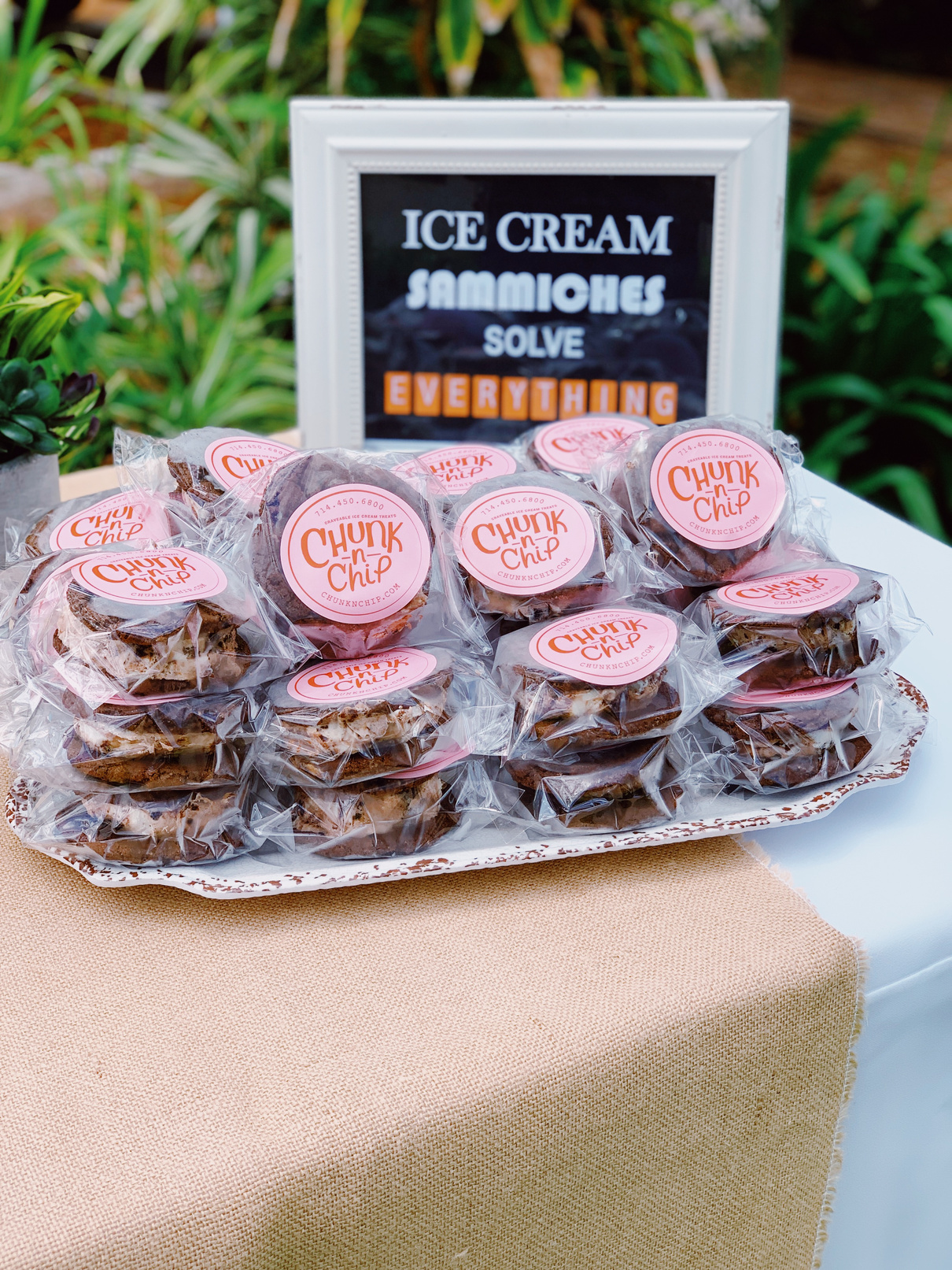 Individually wrapped Chunk-N-Chip frozen ice cream sandwiches on a serving tray