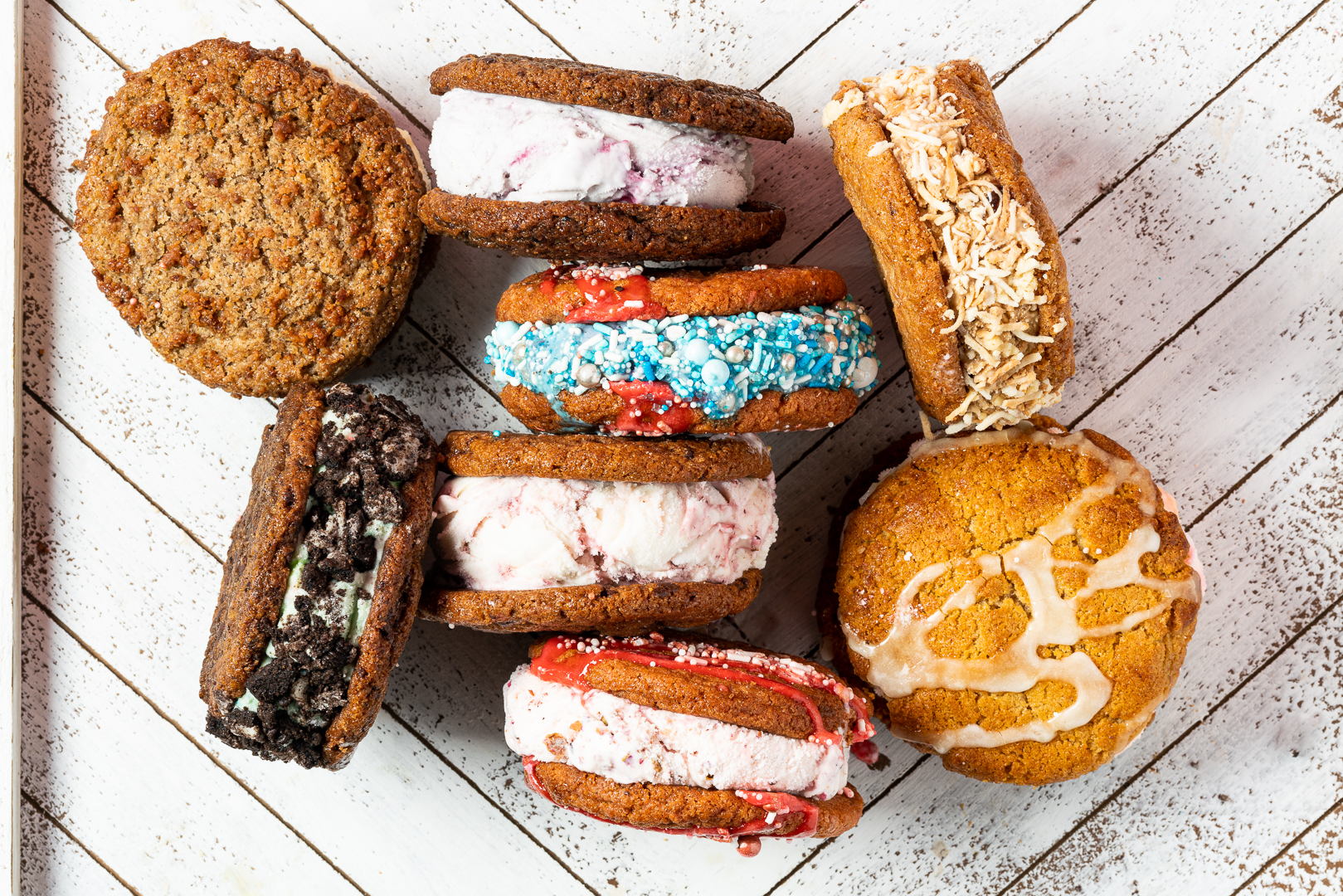 Assortment of Chunk-N-Chip ice cream sammiches on a rustic wood board